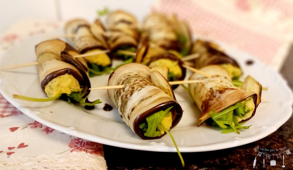 Melanzatini ripieni di humus e rucola